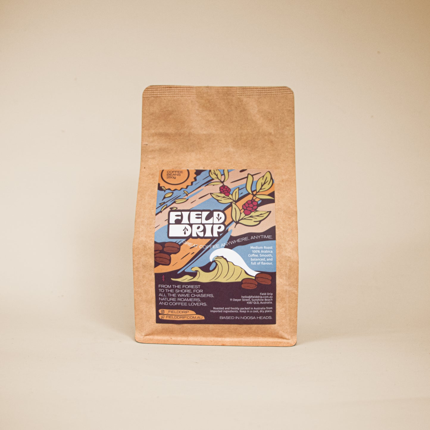 205g Field Drip coffee beans in a kraft paper bag on a beige background, studio product shot.